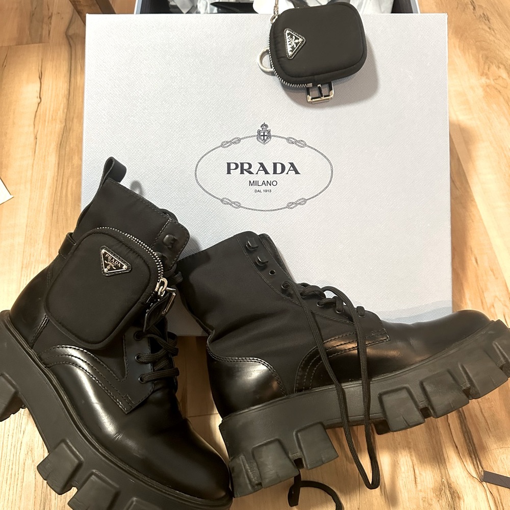 Prada Monolith Leather and Re-Nylon Combat Boots.